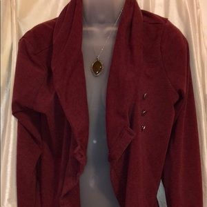 This is dark Maroon sweater like coat.